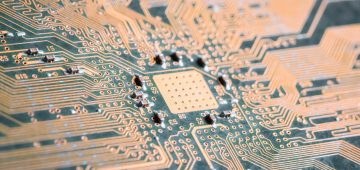 golden electronic circuit board as abstract technology background